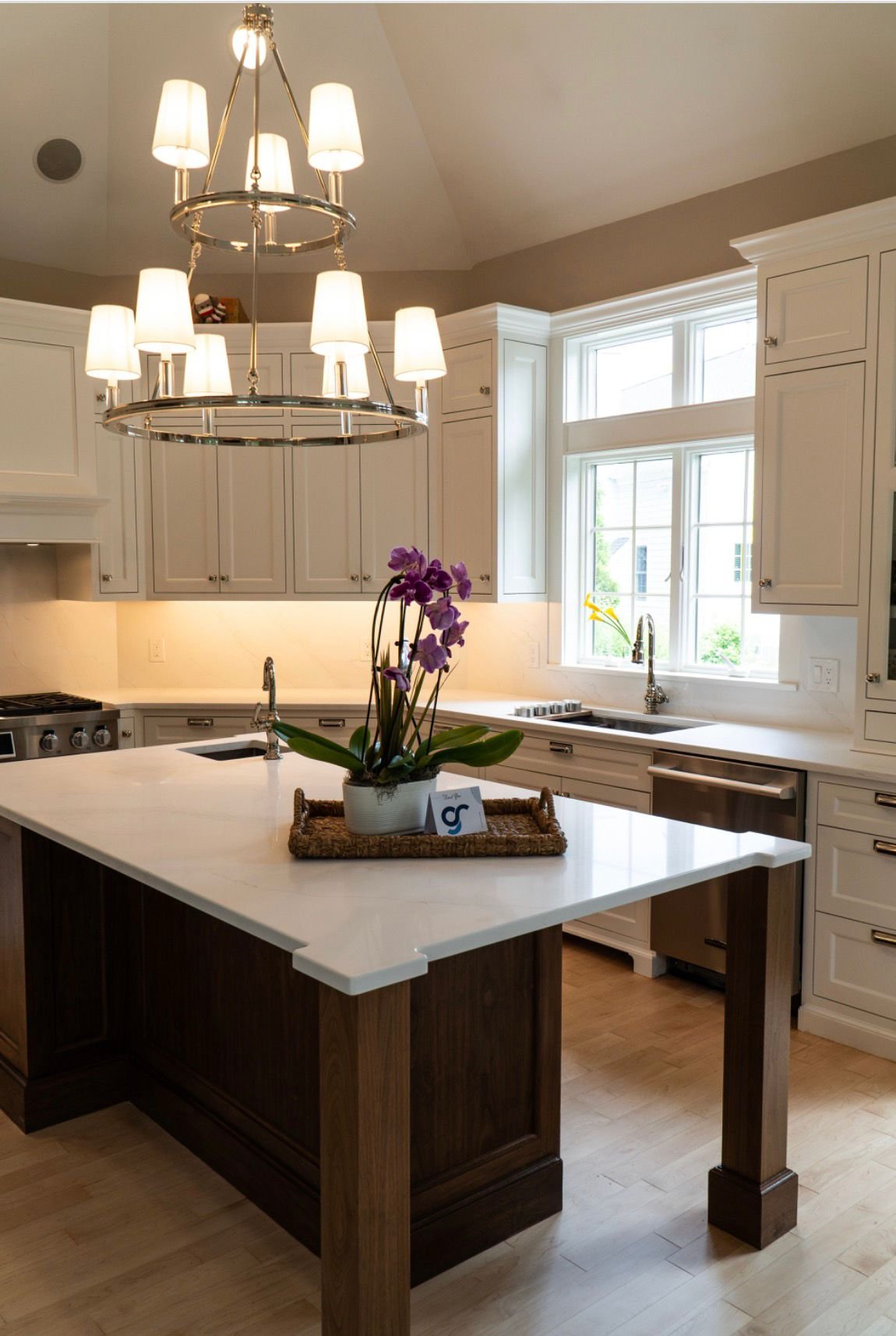 The finished GR kitchen, white inset cabinetry and a walnut island in marble